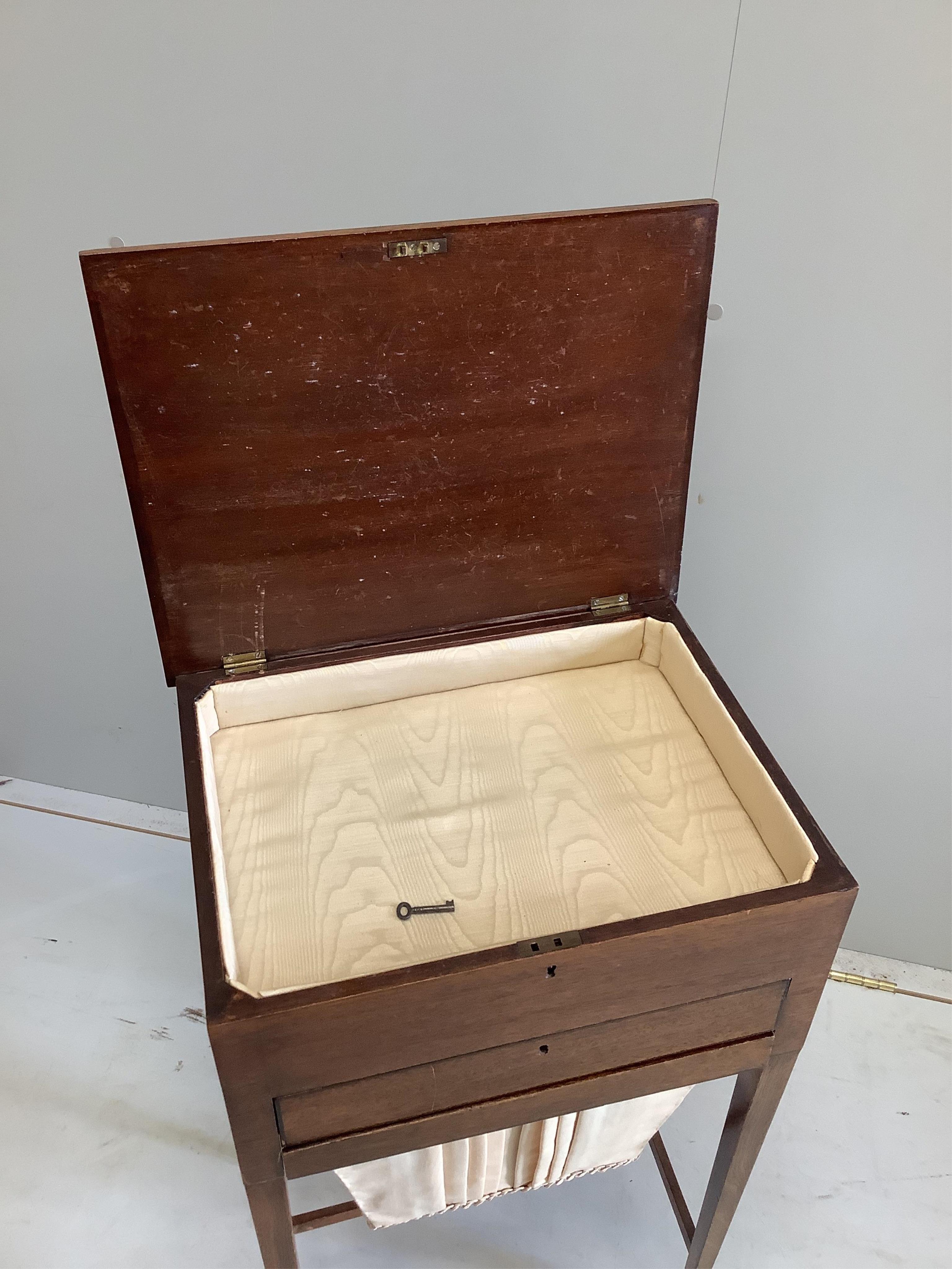 A 19th century strung mahogany sewing table, with hinged top, drawer and sewing bag, on slender square tapering legs, width 42cm, depth 32cm, height 78cm. Condition - fair